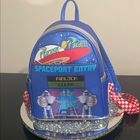 Loungefly Other - Disney Pixar Toy Story loungefly blue pizza planet mini bookbag back pack
